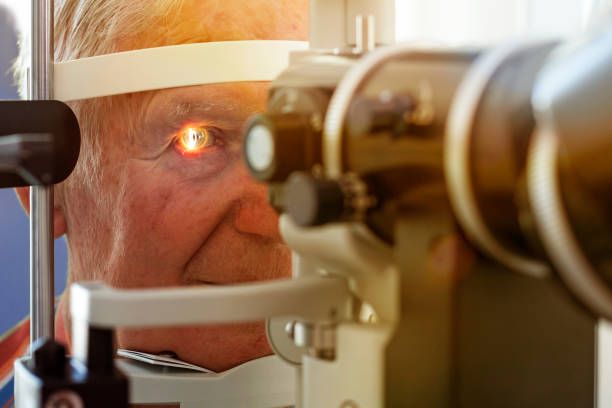 istock Close-Up Of Man Checking Eyes 922825594