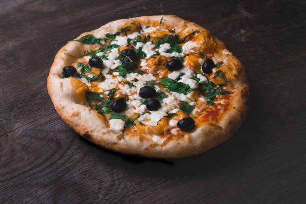 istock High Angle View Of Pizza On Table In Plate On Table 922826152