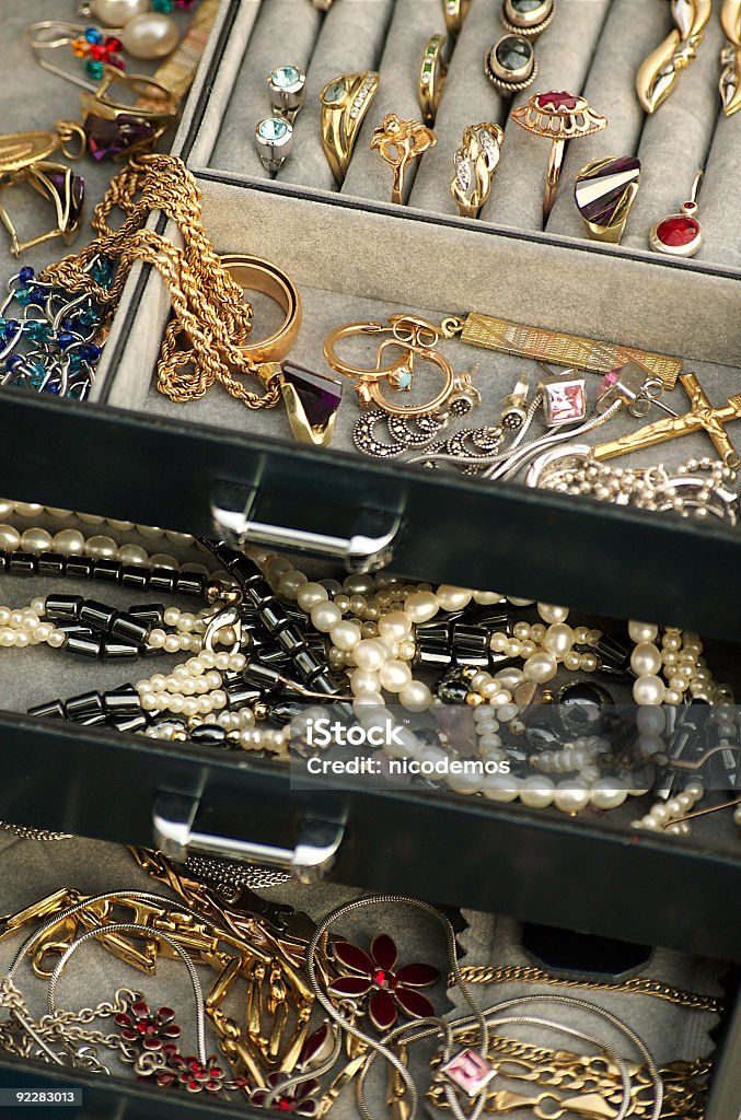 A jewelry box with gold, pearls and stone Box of Beautiful Gold Jewelleries. Jewelry Box Stock Photo