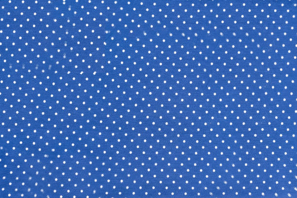 istock Texture of blue fabric in peas 922833816