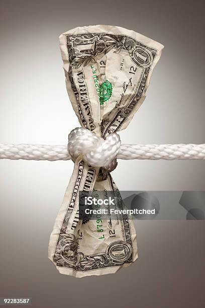 American Dollar Tied In Rope Stock Photo - Download Image Now - Tied Up, Tied Knot, Currency