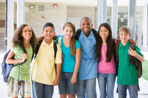 Elementary school class standing outside