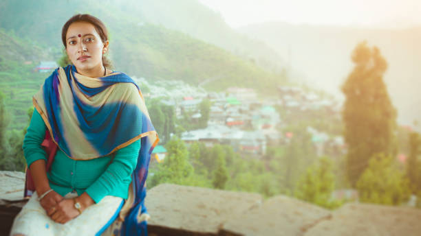 istock Young woman enjoying fresh air and looking at camera. 922846456