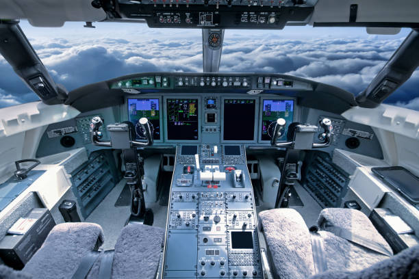 airplane cockpit in flight - cockpit dashboard airplane control panel imagens e fotografias de stock