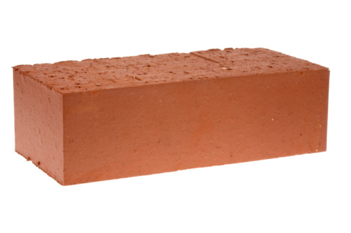 Red solid brick on a white background