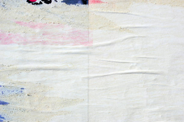 istock Blank old ripped torn crumpled creased posters grunge textures backdrop backgrounds 922854752