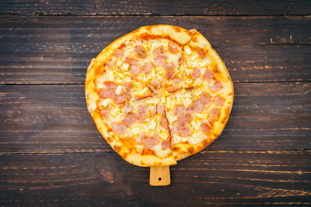 istock Close-Up Of Pizza On Table 922857304