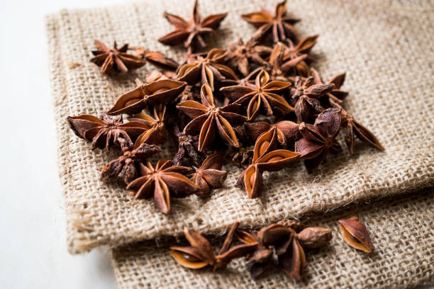 istock Star Anise Spice Fruits and Seeds on a Sack 922857340