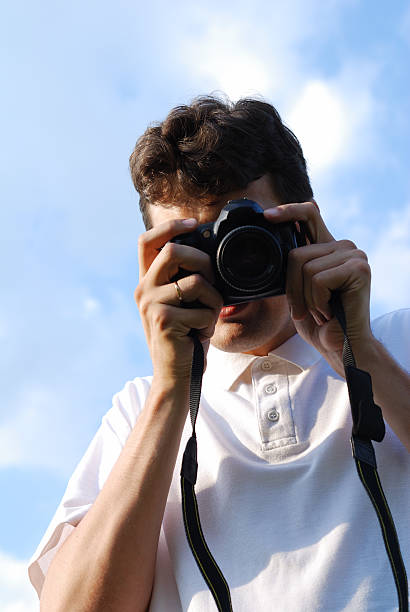 istock Man with photocamera 92285822