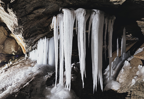 Ice formations deep within a limestone dissolution cave in Northern Nova Scotia.