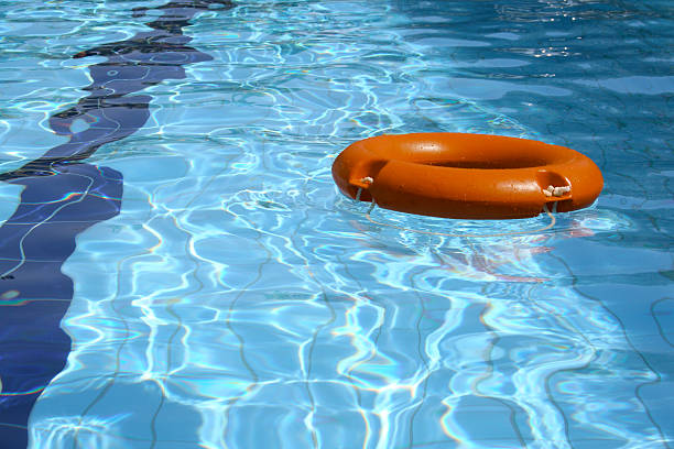 istock Lifebuoy in swimming pool 92286086
