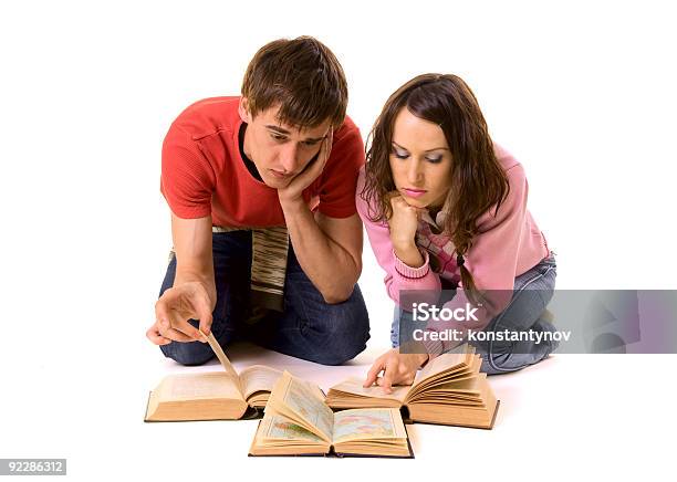 Couple Of Students Doing Homework Stock Photo - Download Image Now - Females, History, Student