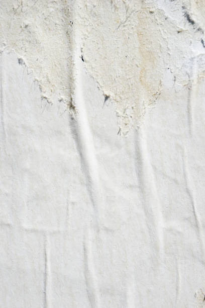 istock Blank old ripped torn crumpled creased posters grunge textures backdrop backgrounds 922872200