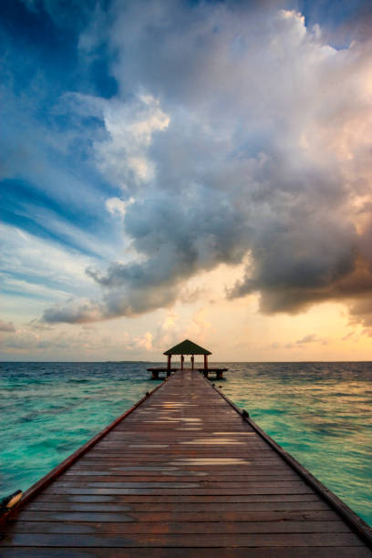 istock Maldives Pier Spectacular Sunrise 922872482