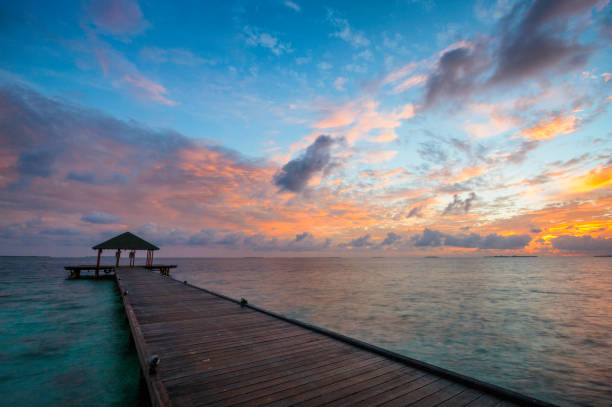 istock Maldives Pier Spectacular Sunrise 922872502