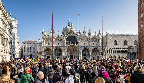 VENICE, ITALY - FEBRUARY 11: Overcrowded San Marco plazza during carnival on February 11, 2018 in Venice