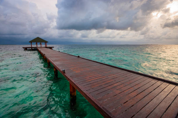 istock Maldives Pier Spectacular Sunrise 922872566