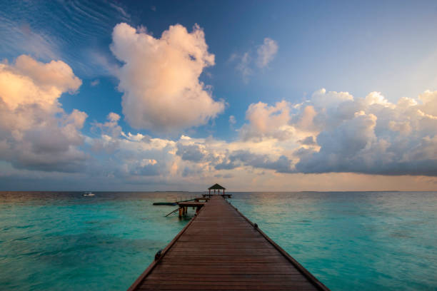 istock Maldives Pier Spectacular Sunrise 922872600