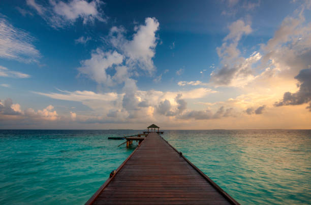 istock Maldives Pier Spectacular Sunrise 922872612