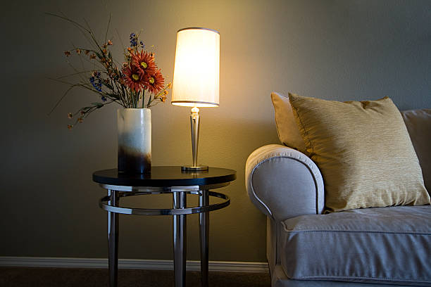bouquet with flowers near lamps on the wall in retro styles for the background, decor in the apartment, background interior