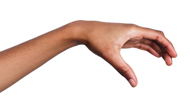 istock Female hand picking up something, cutout 922876570