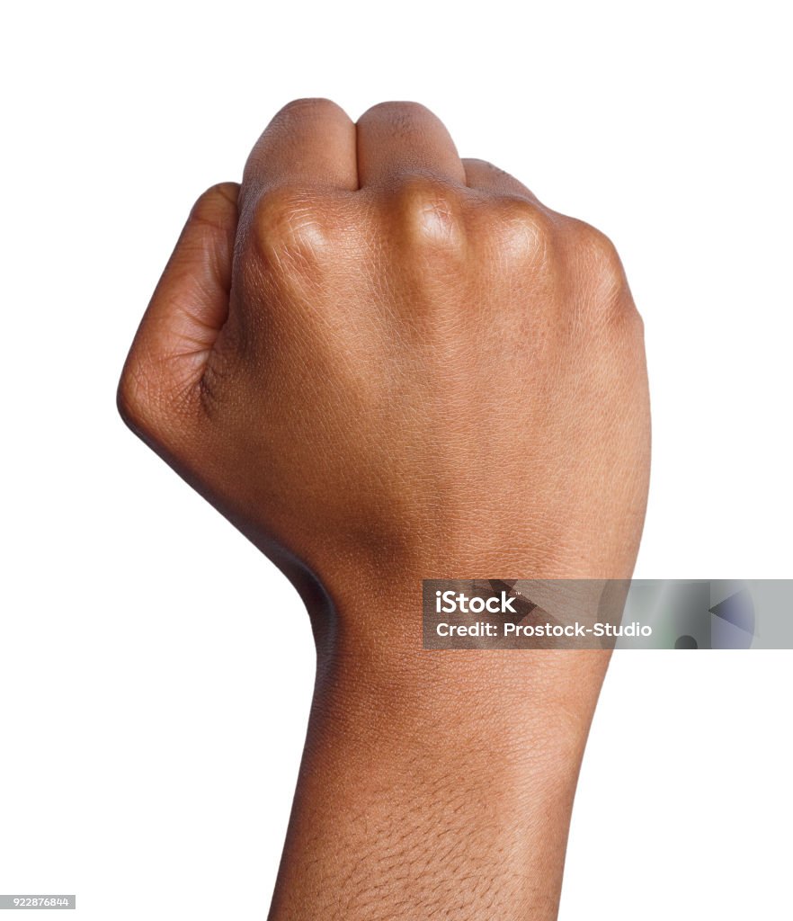 Hand gesture, woman clenched fist, ready to punch Fight hand gesture. Black woman clenched fist, ready to punch, isolated on white, closeup, copy space Fist Stock Photo