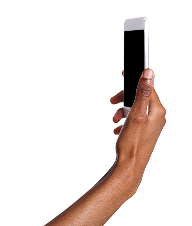 African-american woman taking picture using smartphone. Black hand holding mobile and making selfie, isolated on white