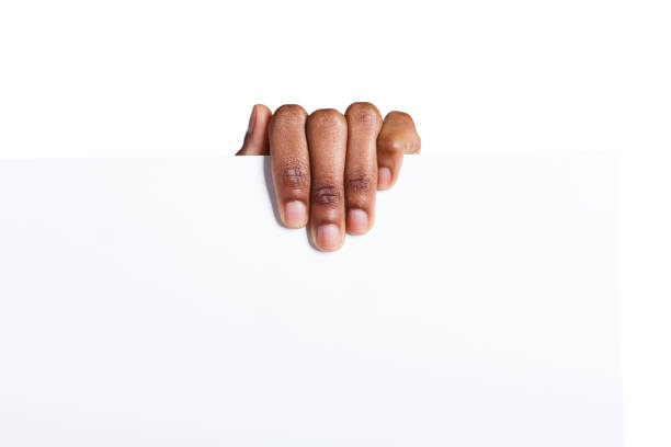 Black hand holding blank advertising card