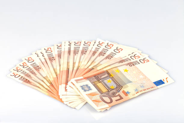 One thousand euros in fifty notes isolated on white One thousand euros in fifty notes isolated on white background. number 1000 stock pictures, royalty-free photos & images