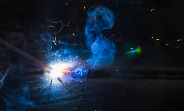 SMAW – Shielded metal arc welding. SMAW – Shielded metal arc welding and welding flame at spark  point. oxyacetylene stock pictures, royalty-free photos & images