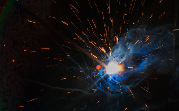 istock SMAW – Shielded metal arc welding. 922882818