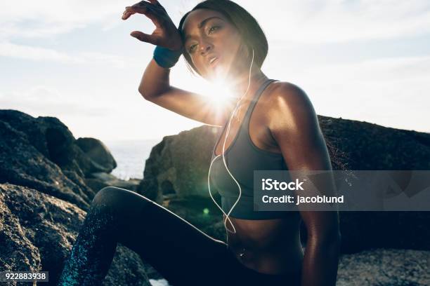 Female Looking Tired After Intense Physical Training Stock Photo - Download Image Now