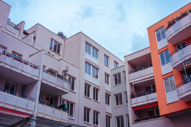 istock grey and red facaded apartment buildings 922886518