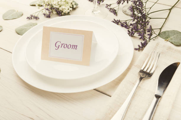 istock Groom card on white plate 922893334