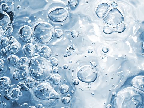 Surface of a liquid with bubbles.