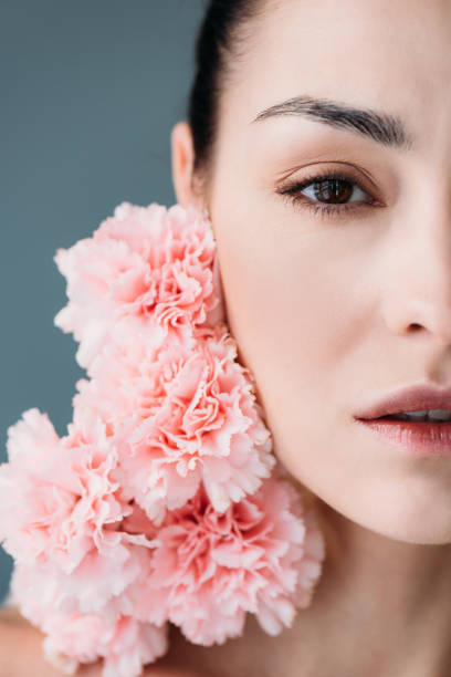 istock Young woman posing with pink cloves 922901166