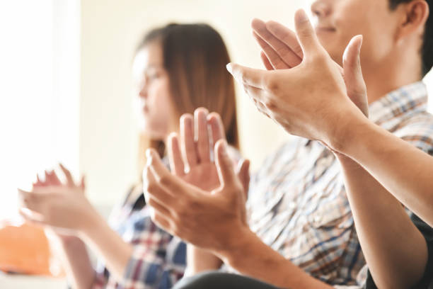 istock Asian business people clapping hands. 922913940