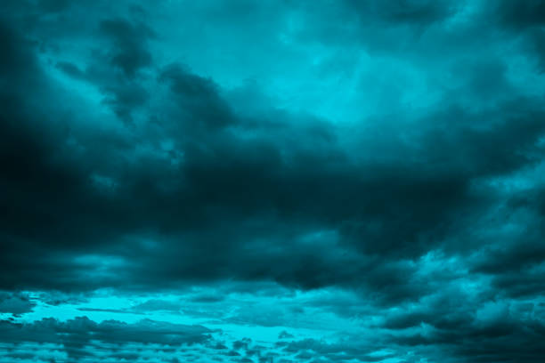 istock Dramatic Dark cloudy stormy sky in the evening 922917516