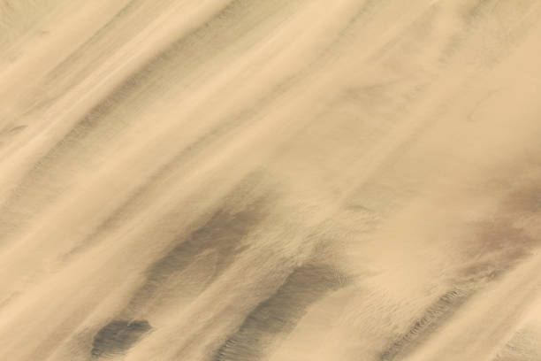 istock Trails of dust and shifting sand dunes textures 922918952
