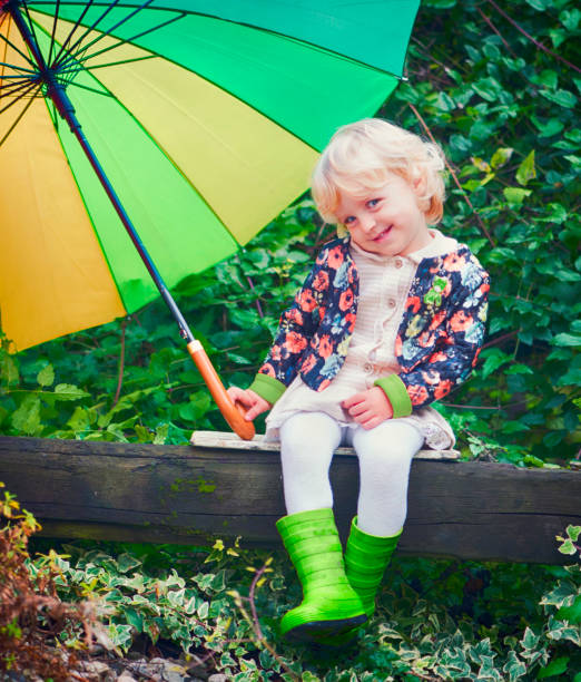istock Beautiful Child with Umbrella 922922698