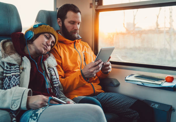 istock Couple traveling with train 922928488