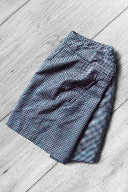 istock Skirt on wooden background 922937376
