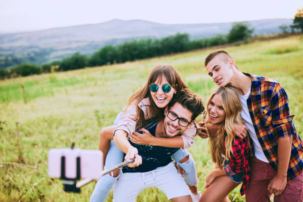 istock Group of friends taking a selfie. 922938780