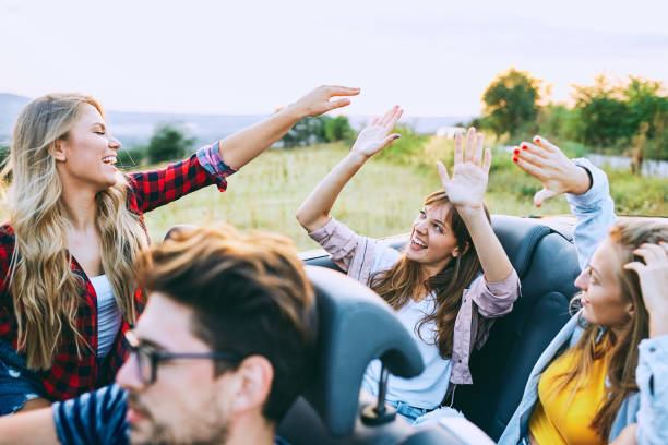 istock Teenagers riding in the car. 922940080