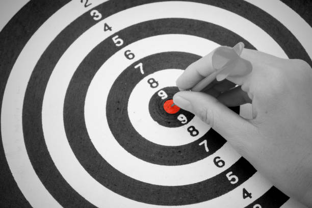 istock Hand put a dart hit on the target,Goal target concept 922950122