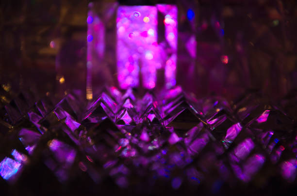 istock Close up of crystal facets in mysterious violet light. 922953388