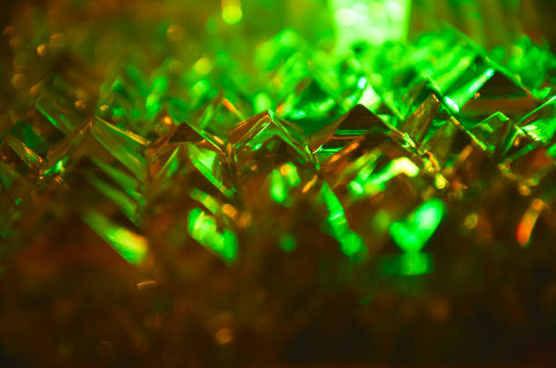 istock Close up of cut crystal facets in mysterious emerald light.Magic shiny background 922953438