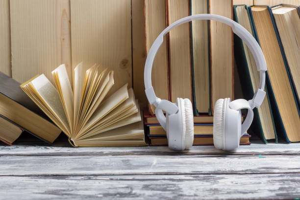 istock Open book, hardback books on wooden table. Back to school. Copy space 922958240