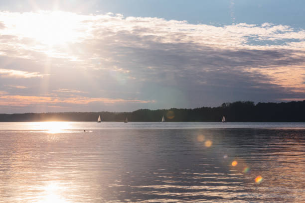 istock Sunset at the lake with reflection in the water 922958368