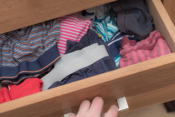 istock Opening a chest of drawers with underwear inside 922961844
